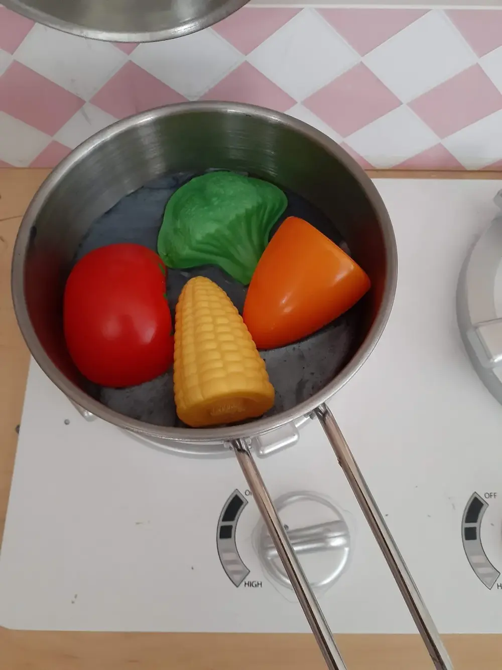 Sensory slime activity with pretend vegetables for language learning